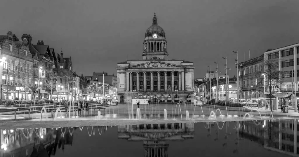 Nottingham's Old Market Square and Council House at dusk, with the fountains